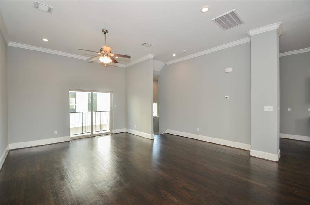 Photos from previous listing.Check out the size of this room! Don't let the it fool you. The ceilings are very high and what about that crown molding?