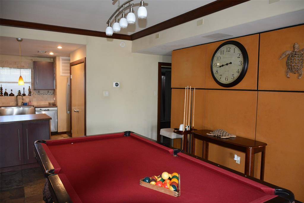 Spacious kitchen with large stainless steel sink, all appliance included. Corian countertops.