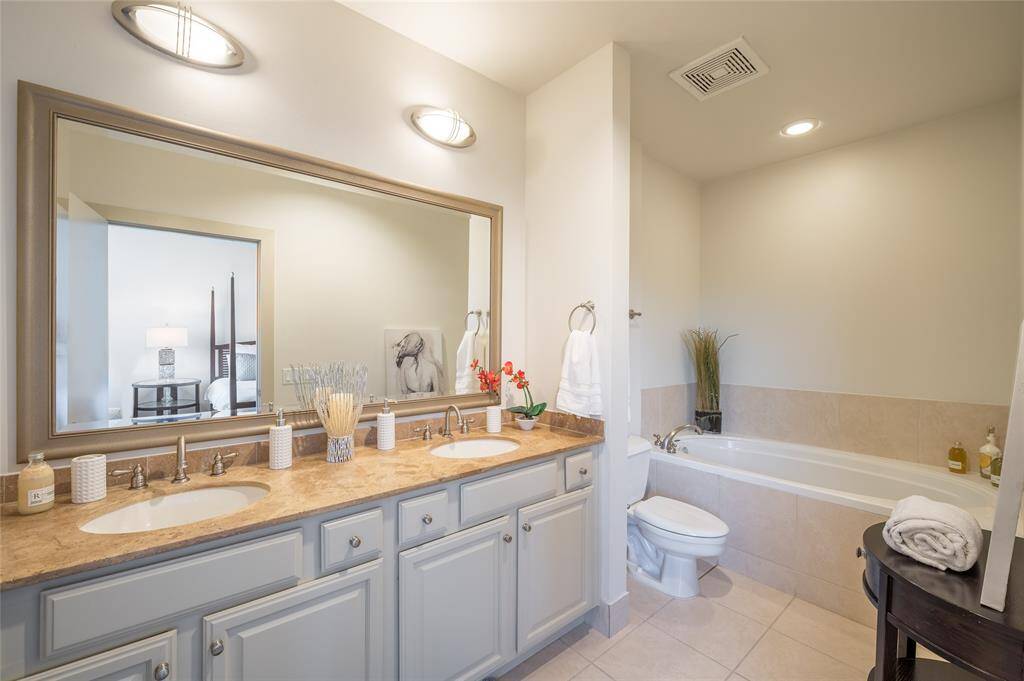 Dual vanities in the primary, perfect for the morning.