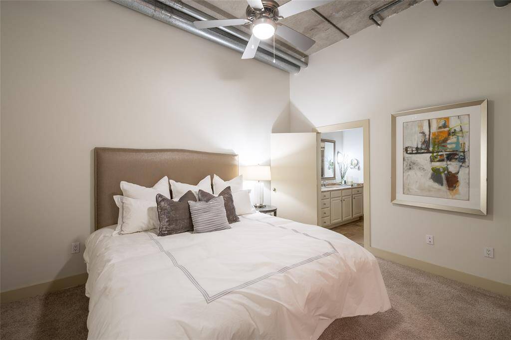 The generously sized bedroom serves as a tranquil sanctuary, designed for ultimate relaxation and comfort.