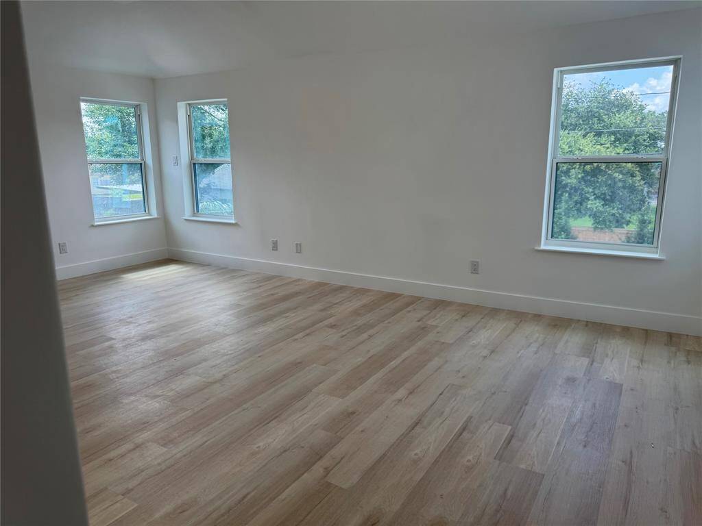 Primary bedroom overlooking the backyard.