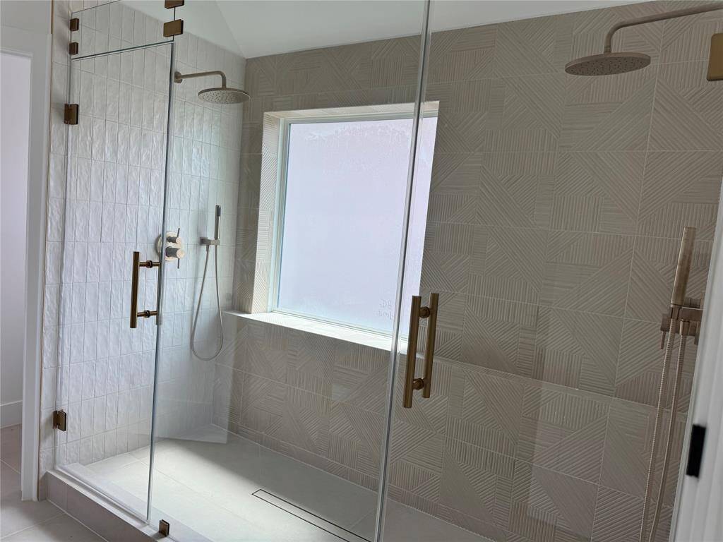 Primary luxury walk-in shower.