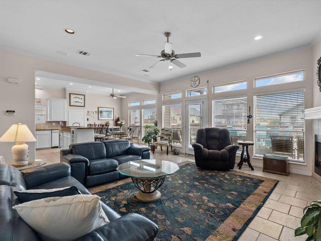 Wide open living space with lots of windows and door to main deck!
