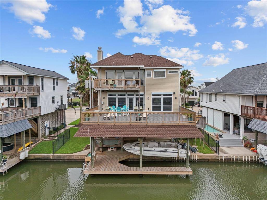 Covered boathouse and massive main deck with recent Trex decking!