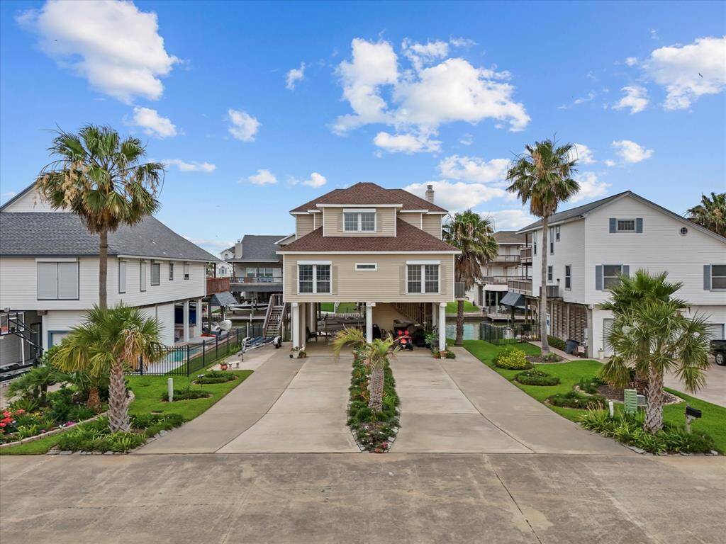 The off-road parking is framed and divided by exquisite landscaping.