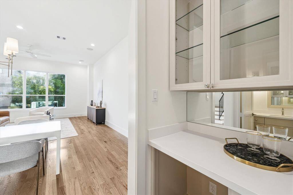 A beverage bar with access to dining and living.