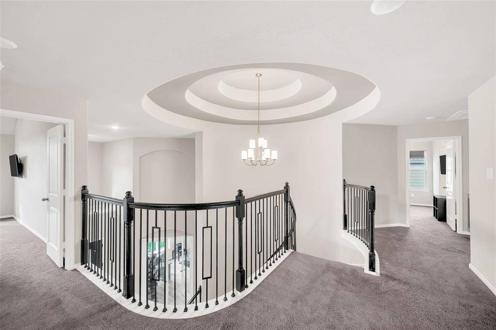 3 large bedrooms with walk-in closets reside upstairs