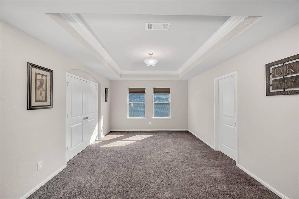 The media room extends seamlessly from the game room
