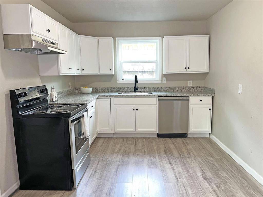 Kitchen with new stainless steel appliances