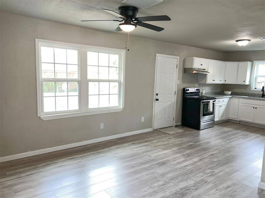 Kitchen / dining area located in the back of the home
