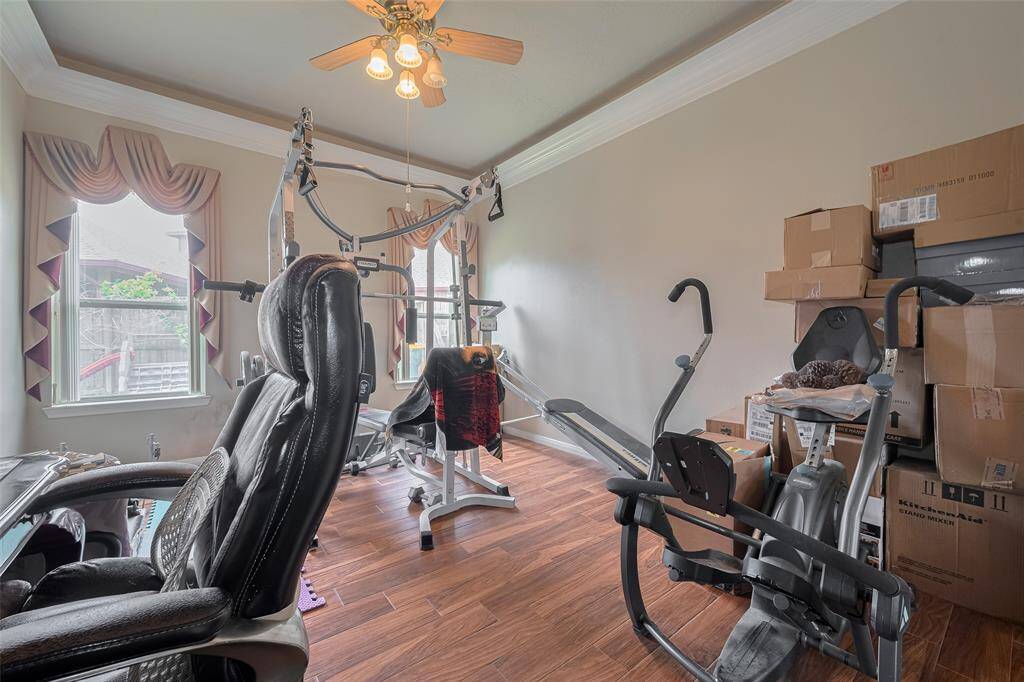 Bedroom being used as a fitness room