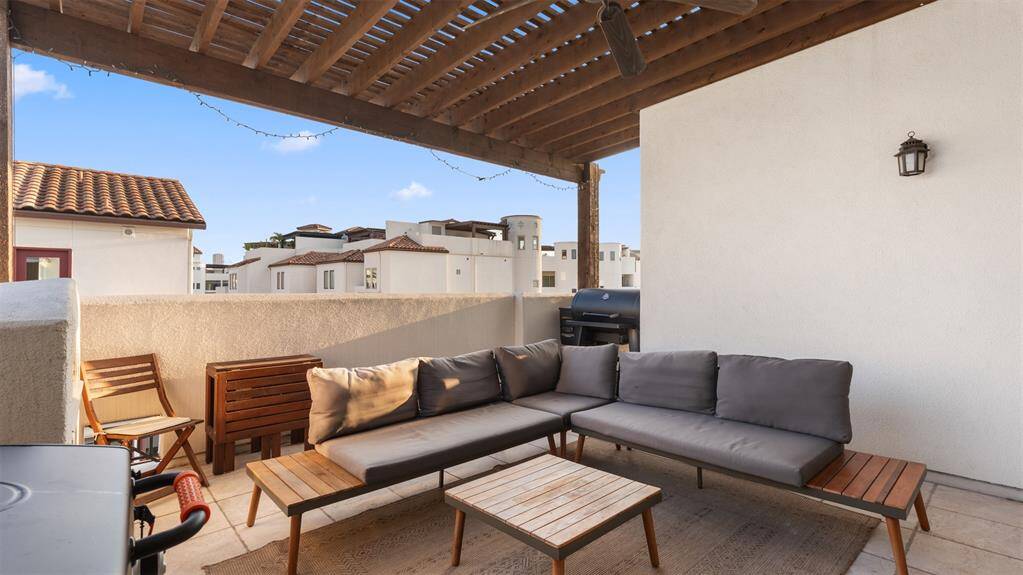 TV mounted out of frame. On this patio, you have it all.