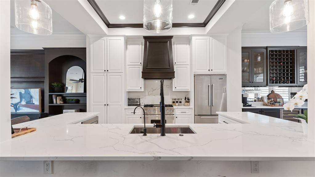 Completely reimagined kitchen with REAL quartz counters and Viking appliances
