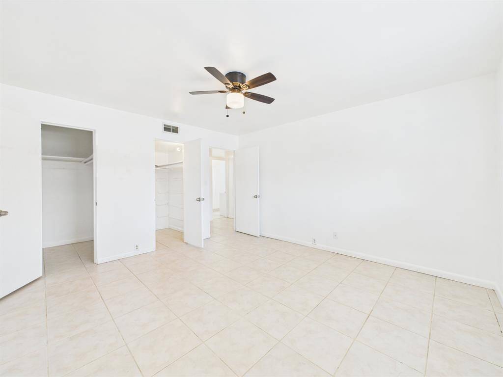 Bedroom with two walk-in closets