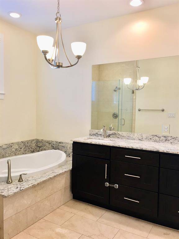 Another view of master bath with double vanity.