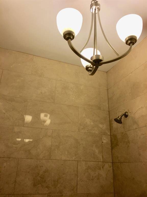 Chandelier lighting for secondary bath on third floor