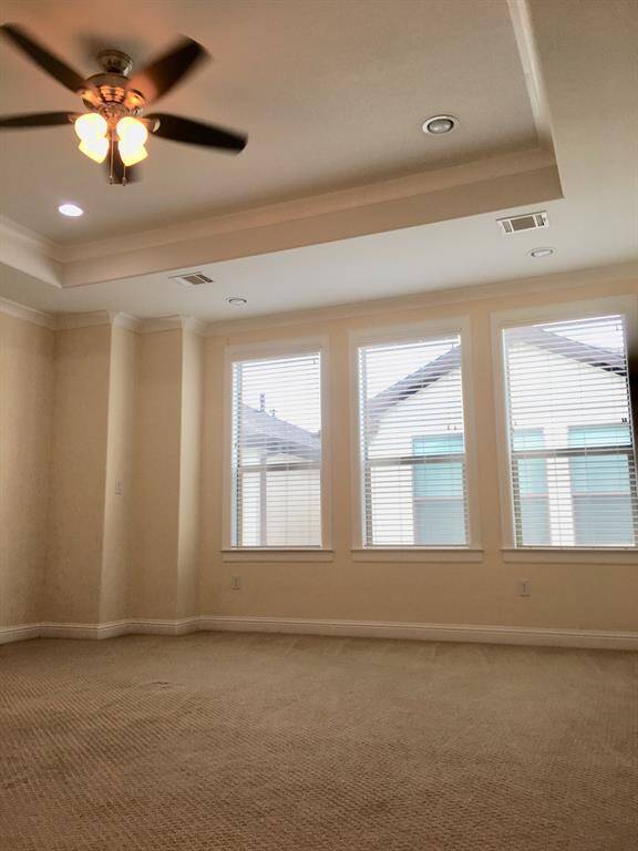 Master bedroom on third floor with coffered ceiling