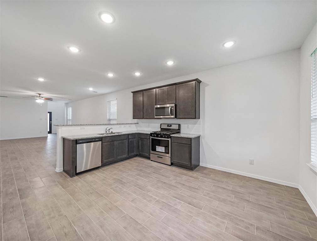 View from the Breakfast Nook showcasing the gourmet kitchen and space offered to make your own.