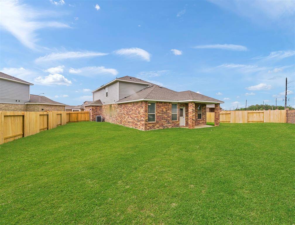 Beautiful Backyard offers an abundance of yard space and luscious landscaping to utilize and make your own backyard oasis!