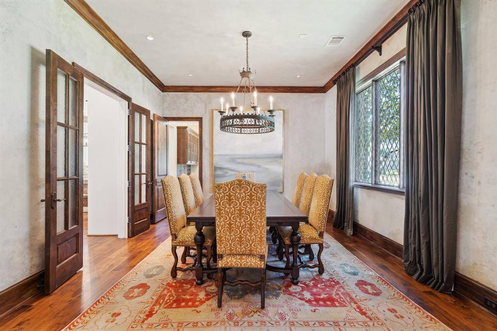 Dining Room has a french door entry with textured glass.