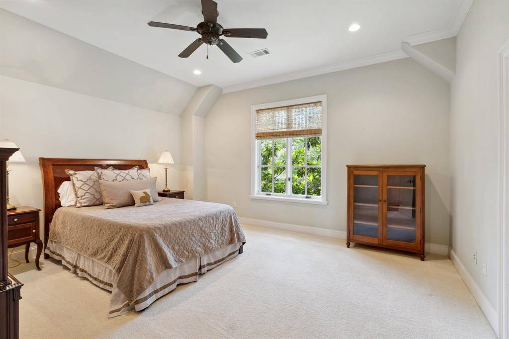 Upstairs Bedroom #3 with an ensuite bathroom and walk-in closet.