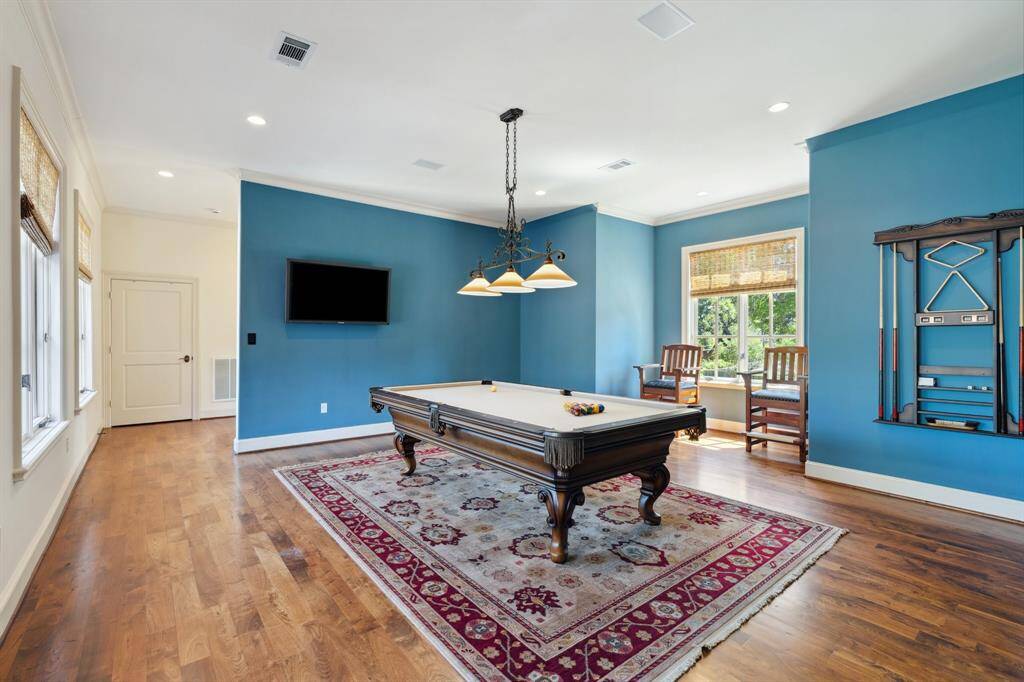 The large upstairs gameroom is filled with natural light.