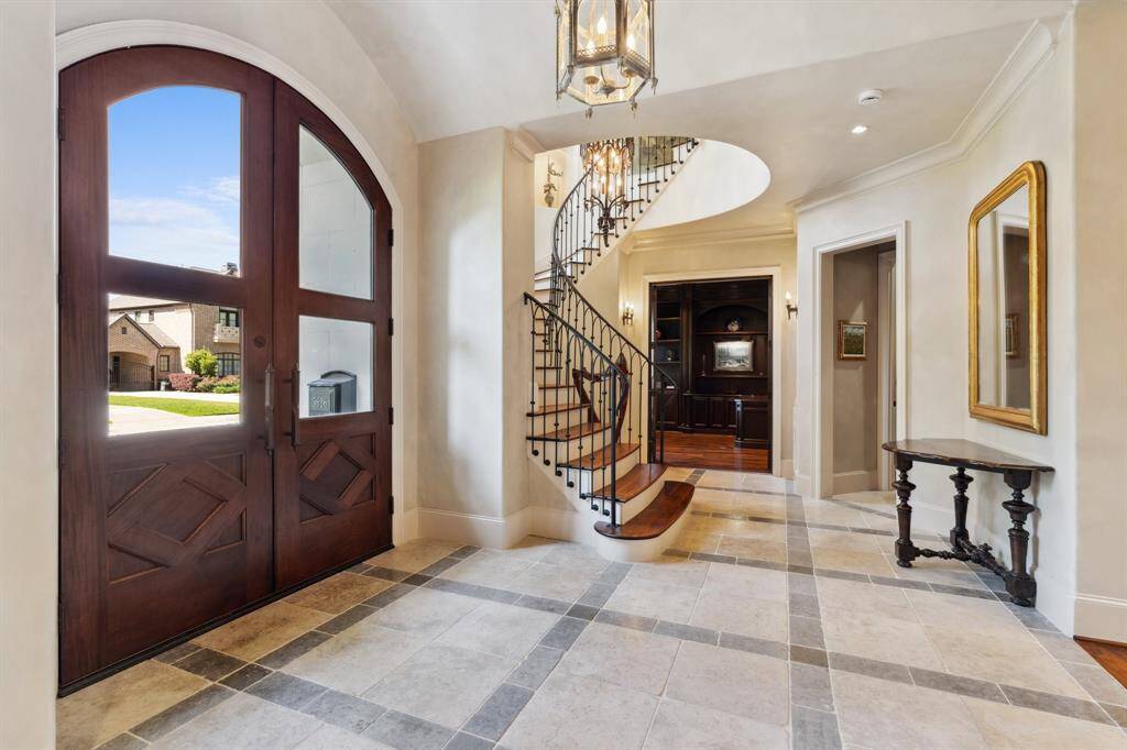 Greeted by barrel-vaulted ceilings and a circular stairwell.