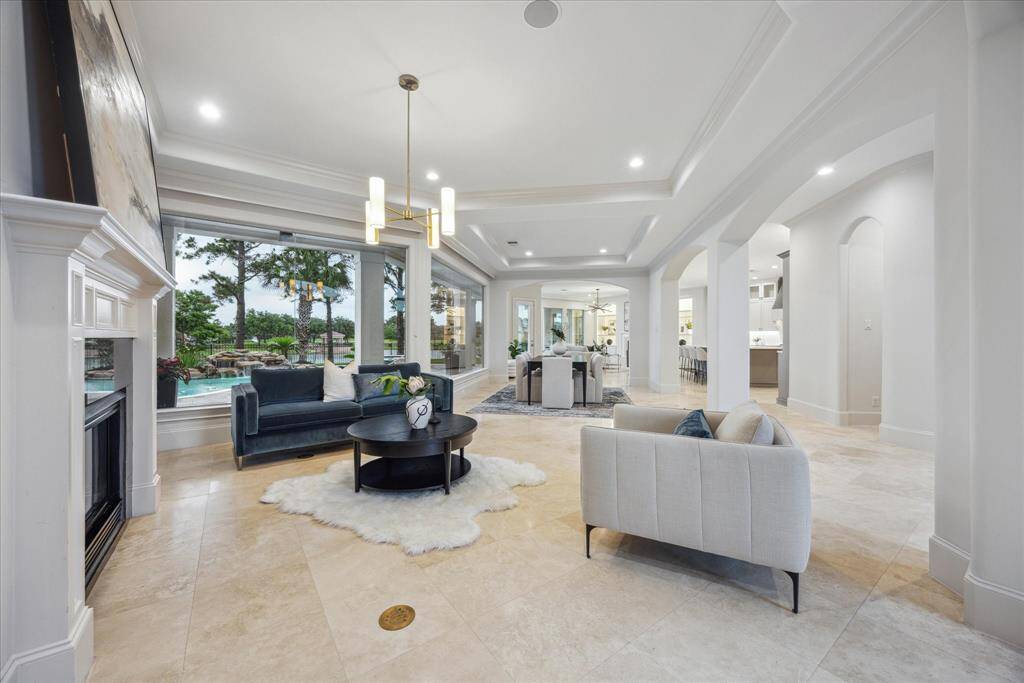 As you exit the primary suite, you're welcomed back into the main living spaces.