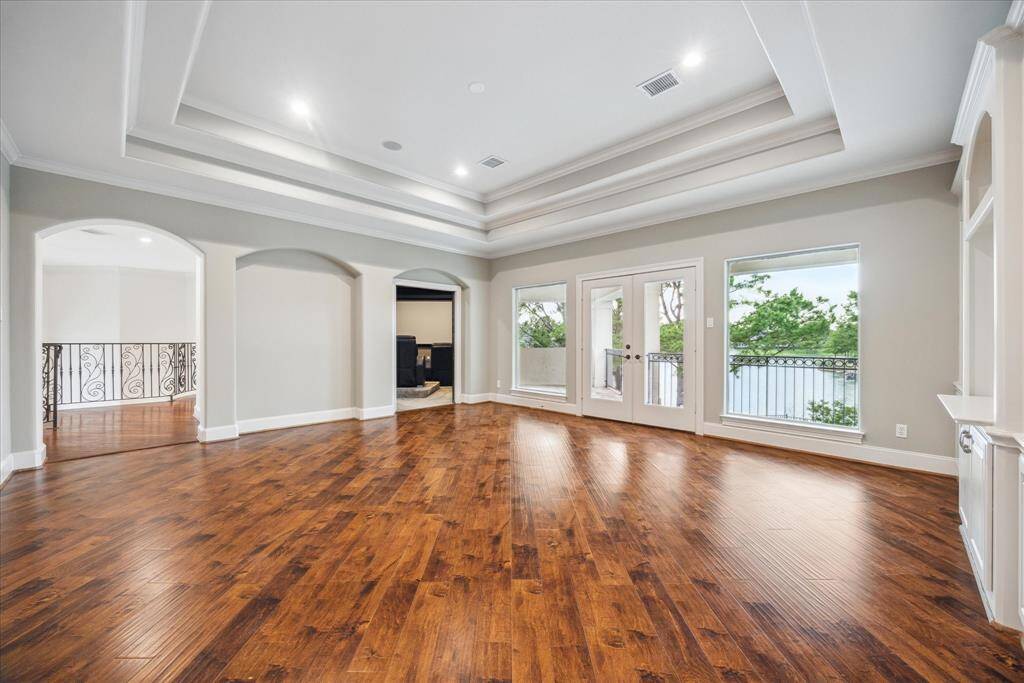 This alternate view highlights the seamless connection between the game room and the media room.