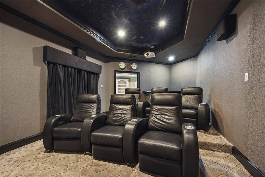 Whether hosting guests or enjoying a quiet night in, this space combines comfort and entertainment in one stylish setting.