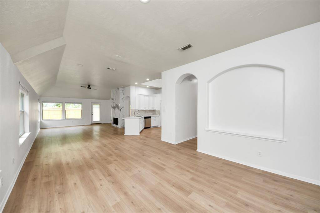 Your bright open floor plan with modern features and new flooring throughout!