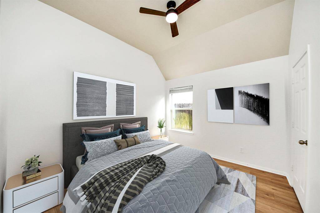 One of the secondary bedrooms staged virtually