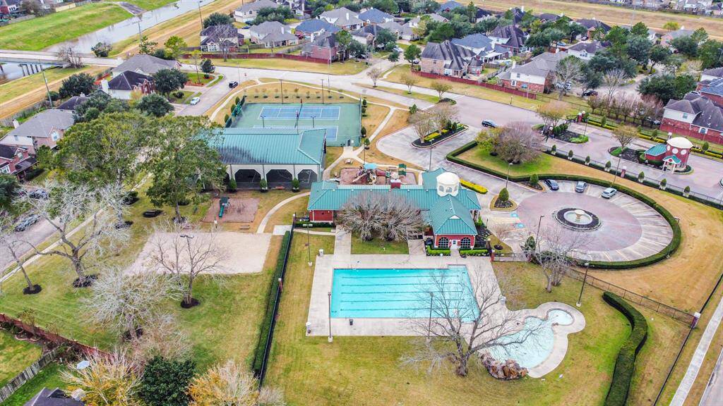 Tennis courts, playground, clubhouse and pool.