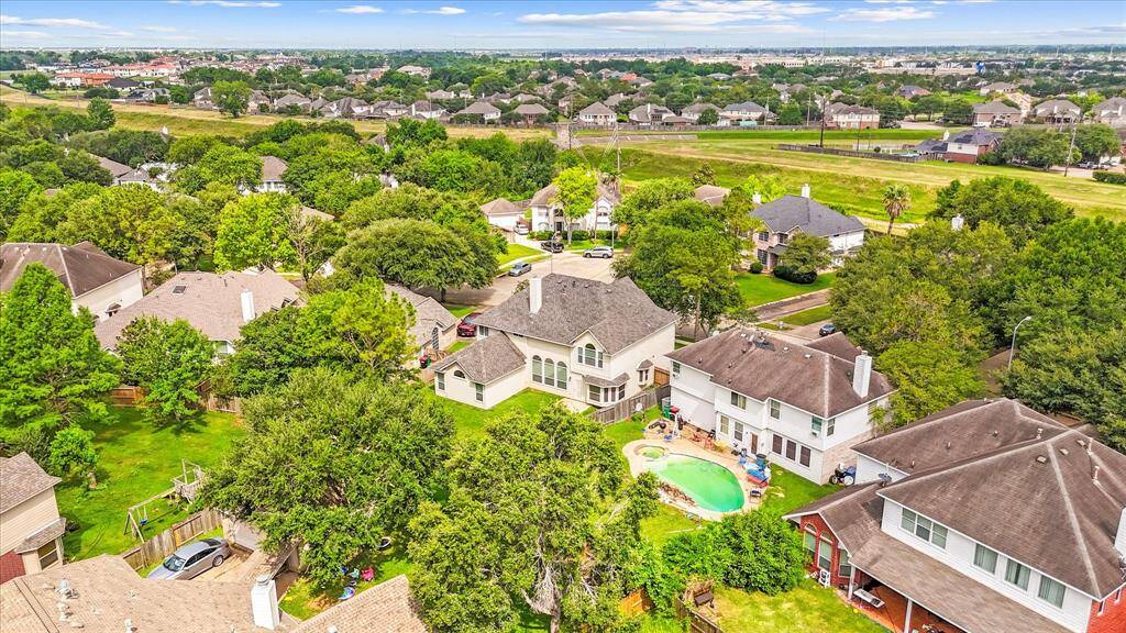 A view from up high, check the 2025 roof! lower your home insurance!