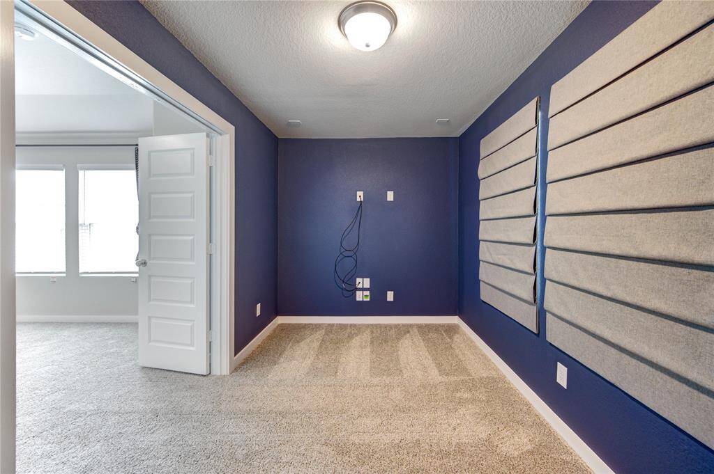 Media Room Upstairs with windows