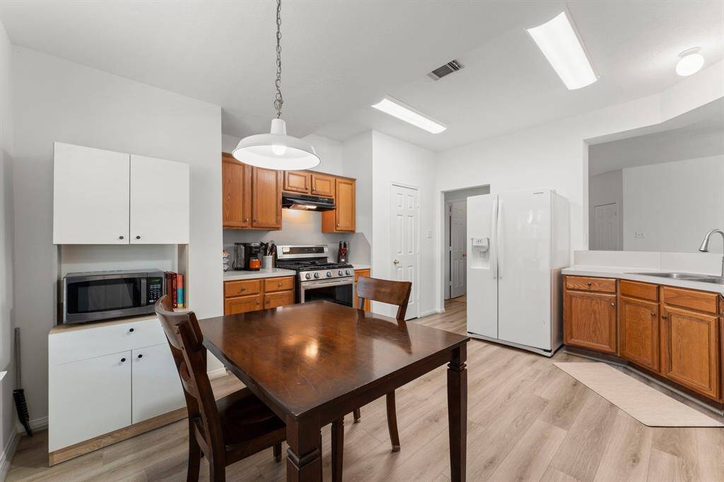 Walk-in pantry to the right of range.