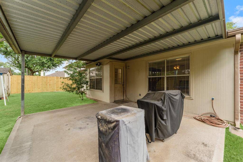 Large covered patio area to enjoy outdoor living or anything else you many want to do.