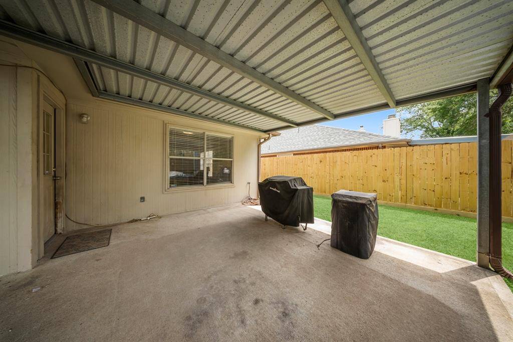 Large covered area for outdoor seating, dining, grilling, or all of it.