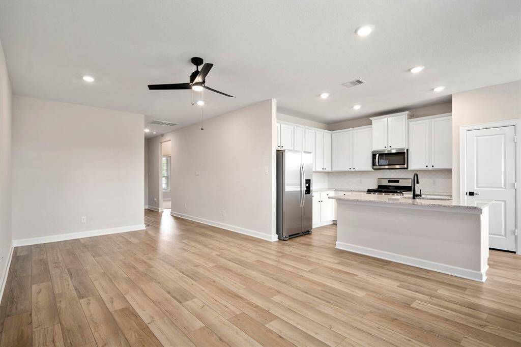 If you love an open concept kitchen and living area, you will love this space.