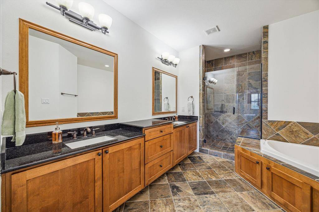 Spacious primary suite with TWO walk in closets