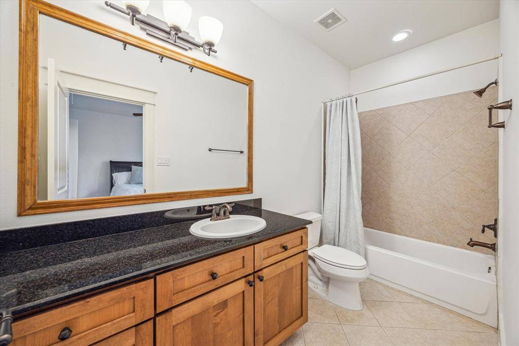 Secondary bedroom also located on the 3rd floor is a great size with full en suite bathroom