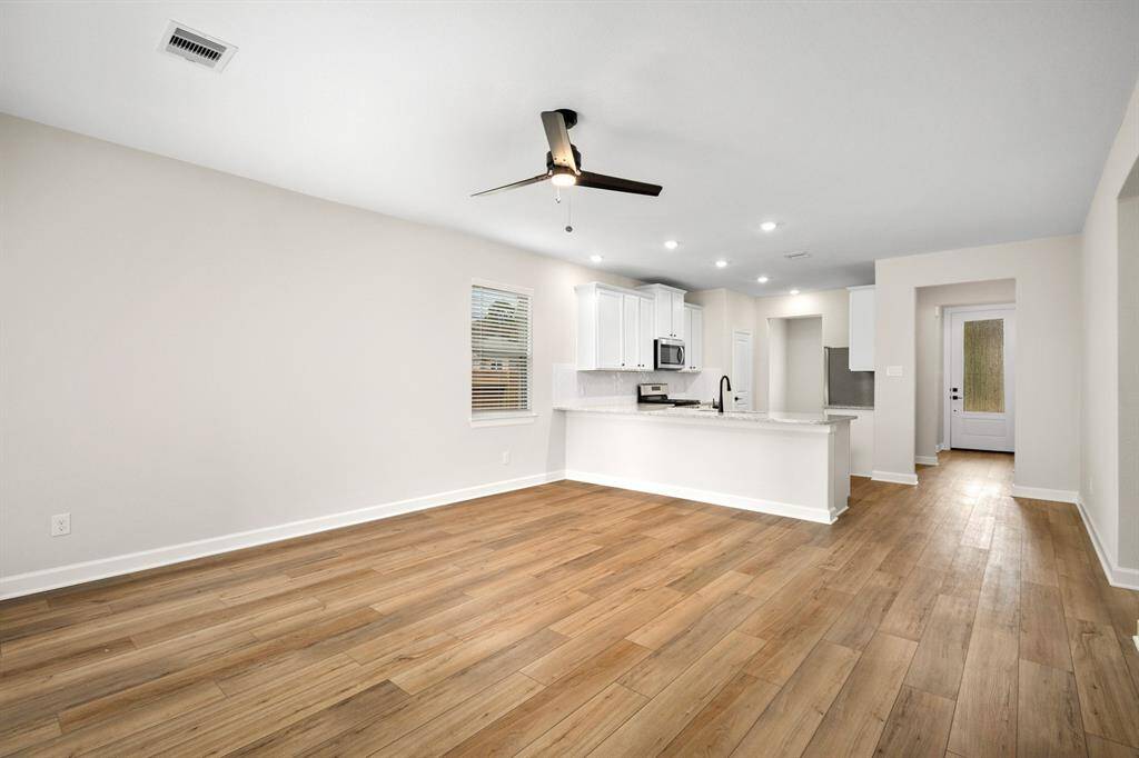 If you love an open concept kitchen and living area, you will love this space.