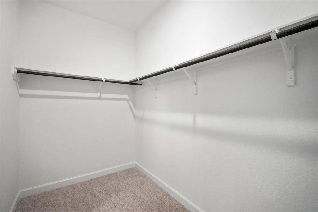 Wow! This is a fashion lover's dream closet.