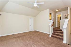 Upstairs you have a spacious gameroom, media room and half bath.