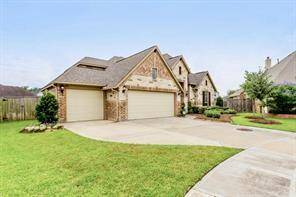 Different angle view of this beautiful home. Enjoy the convenience of a three car garage.