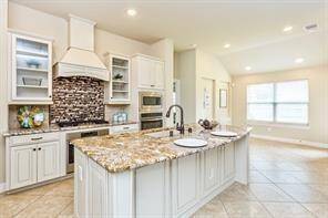 Meal prep and clean up will be a breeze in this stunning island kitchen!