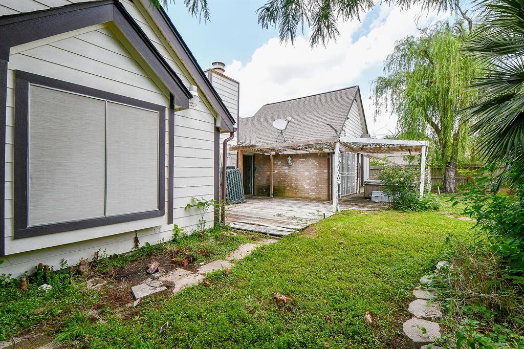 The back yard needs some TLC, but the possibilities are great.