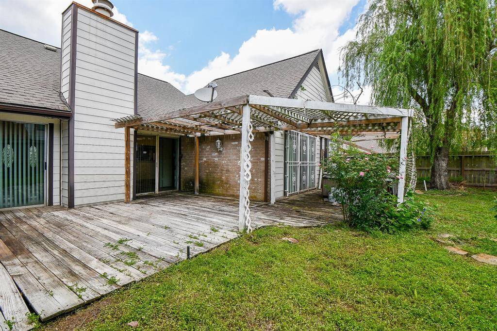 The outdoor space behind the family room.