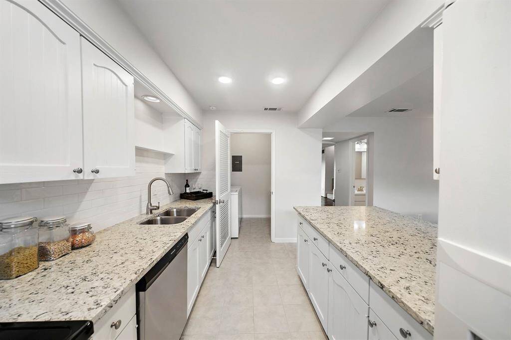 A view towards the walk in pantry and laundry room.*pic from the previous listing