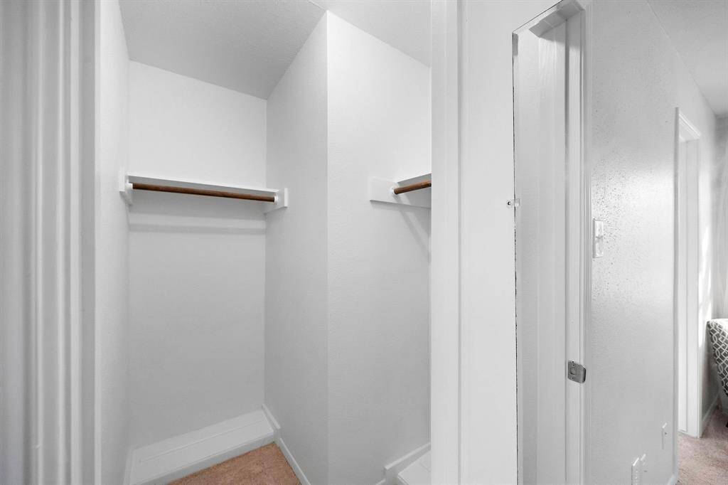 Walk-on closet in the primary bedroom.*pic from the previous listing